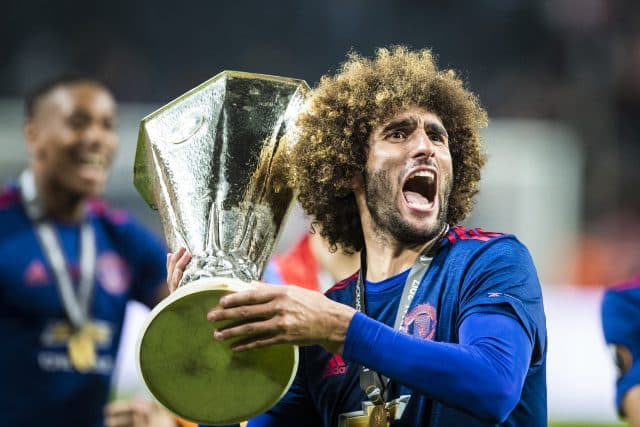 Marouane Fellaini with Europa League Trophy (Sports Photographer - Michael Campanella)